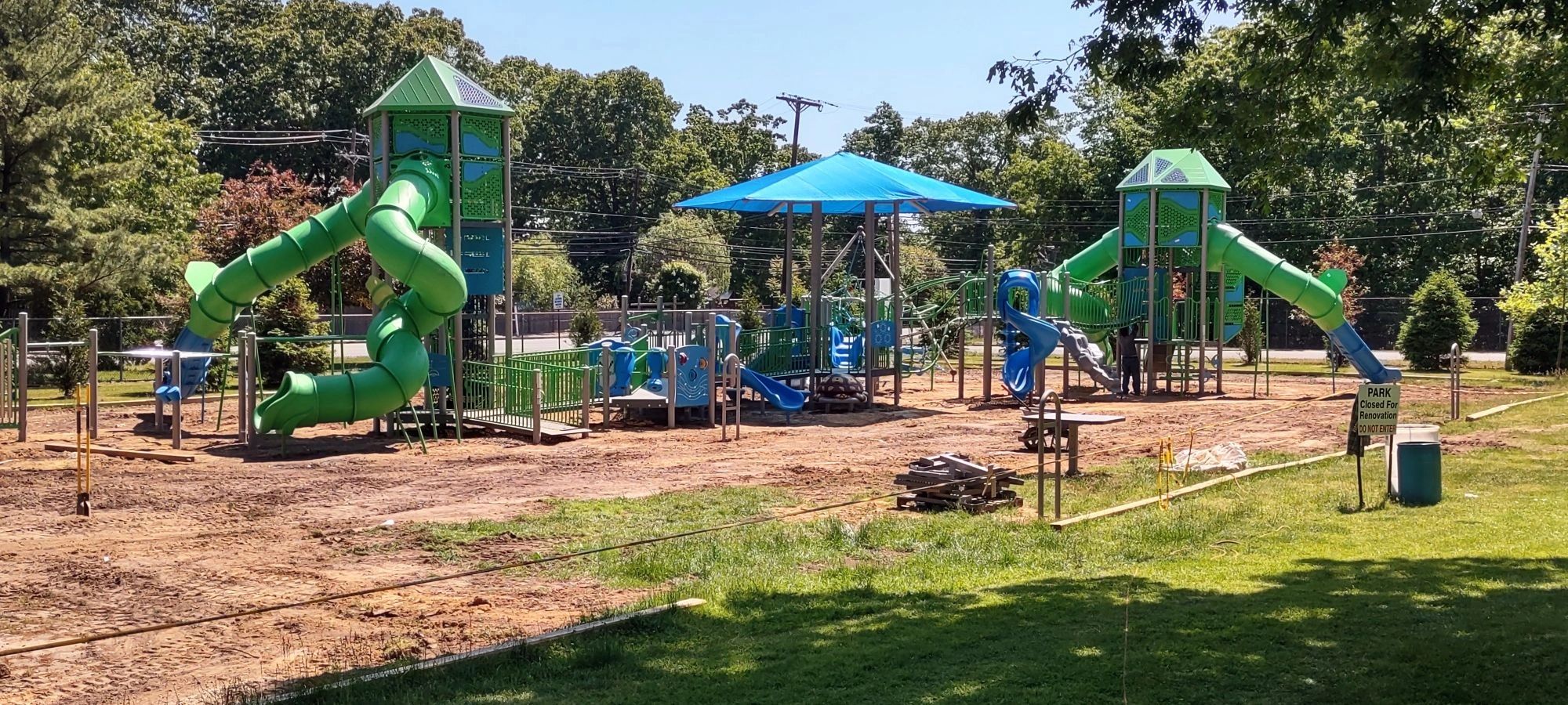 Playground with green equipment in a park